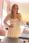 This dress is exactly as it seems on the website! It is a bit sheer, so I would recommend a slip skirt, or nude underwear. The sleeves are bigger than normal, but all is good when you tie it tighter in the back. Overall, this is the perfect mini dress to wear for a night out, or for family photos :) - Lauren R.