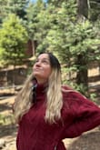 Wore this on a road trip to Colorado. Was super cozy to wear in the car. It's thick and the material is well made. I would suggest wearing a long sleeve tee underneath since the pattern in this sweater has holes. - Brittany J.
