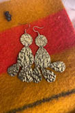 I was so excited to get these&unfortunately, they tarnished (to an odd green/brassy color) so quickly I never got to wear them. They were kept dry and wrapped in a wool jewelry pouch. Total waste of money. - Shanha G.