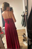 This dress was great and I LOVE the color! It is a darker red than in the photo online but still a great color. It was definitely too long though. I needed to take 3 inches off the bottom even with 4-inch heels. I also wish the slit was a little higher so in general I am just too short for this dress. - Alex S.
