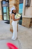 Everyone loved seeing me in my pant suit. The jumper was a little long for me. - Helen O.