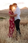 Loved wearing this dress for my engagement shoot. We were in a open field with mountains surrounding us. Lots of sunset/gold colors, this dress went perfectly with the setting. Lots of movement too. Very comfortable, adjustable, and flattering! - Tabitha M.