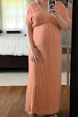 Ordered this for my baby shower as I was looking for something I wouldn't have to alter the length. This fit me perfectly upon arrival so if you are taller than 5'3" it is probably too short for you (would be even better for someone around 5'1"). Giving it four stars because it smelled very badly of chemicals and I had to wash it which made it shrink slightly even with air drying. Had to use some fashion tape for the deep v-neck.
All in all very happy with this purchase and looking forward to wearing it post-pregnancy as well! - Kayla S.