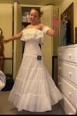 Okay first off, I absolutely LOVE the style of this dress. It fits well, stays up and has a GREAT spin. My only complaints are that is very see-through (but fine with a slip underneath) and the skirt is heavier than I initially though it would be. - Sophia S.