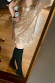 This dress runs true to size, the perfect length, and not at all itchy (like I feared it would be with the sequins). I bought it for a Taylor Swift concert to recreate my favorite tour look of hers (the anti-hero performance) and it's absolutely perfect. - Taylor M.