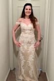 This dress fit like a glove. It did not require any alterations with high heals. 

If you are looking of an elegant dress, this is your dress! - Julia B.