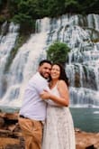 I wore this dress to my elopement at a waterfall and it was absolutely perfect. I'm 5 months pregnant and my regular size before was large , so I got a large in this. It fit but I couldn't zip it all the way up in the back so I just tucked the little corners in and it was not noticeable at all.
I wore a sticky backless bra as well. The only thing is that I had to use fabric tape to tape it down on the sides by my armpits so that it would be sleek.
I also wasn't a huge fan of the fringe on top so I cut it off myself. - Claudia V.