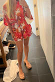 I really loved this romper so much! It was perfect for my Hawaii Honeymoon. The only issue I had with this romper is that the bottom is very short in the front. I'm fairly short; so I'd imagine someone taller it would be more of an issue. - Amanda
