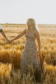 Loved this dress for engagement photos. I will say the dress wanted to open up in the breast area and I had to well secure it with tape to keep from having a slip. Otherwise perfect dress! - Caitlin N.
