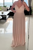 I order size S and M. M was more fit and I returned the S size. Overall quality, material and design is great.
Colour is also great dusty pink, I love how the back and buttons. It make it very sexy. The length runs a bit long. Overall great dress and can't wait to wear at the wedding - Zaya C.