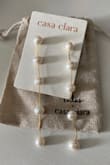 I was unsure if I should buy them at that price but I don't regret buying them at all! They are real pearls and 14k gold. I'm wearing them to a wedding and I'm excited to wear them! Came with a jewelry bag also which was nice. - Shannon R.