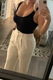 I'm going to Greece for our honeymoon and I was looking for white pants to wear for dinner/sight seeing. I love these! I'm usually a large in bottoms and these fit perfectly. Stretchy and lightweight material and you can't see the lines of my bodysuit through the back which I really like. - Lexi E.