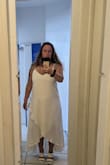 I ordered a medium first based on my waist but was tight in the bust, luckily we were able to do an exchange. This dress is flowy, feels similar to linen, and so comfortable. I am wearing for an elopement on the water and it's perfect. Also, ordered my shoes and they were a perfect fit! - Stephanie A.