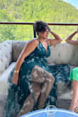 I wore this to a June Wedding in Tennessee. It fit great and was a confidence booster since it did not cling to me. I had a friend shorten the length and close up the slit just a bit because I don't wear high heels really. The best part was dancing the night away with the tulle part. - Reyna S.