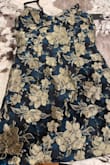 This is not the dress I ordered, which was sequined. See photo, completely different style and fabric. This looks like a curtain. Please send me the correct dress. - Annabelle G.