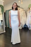 I ADORE this dress! It was the first dress I bought to see if I'd like it for my wedding reception and I was blown away. Doesn't need altering. Stretchy enough to move around and not feel sucked in. It's a snug fit but very comfortable. Amazing material feels very formal and high quality. Obsessed! - Kayla-Ann K.