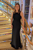 Fits perfectly! Heavy, thick material. It was a bit long for me, even in about 2 inch heels, if I wore it to an outdoor event I would have it hemmed. Chest was tight enough I did not have to wear a bra. Only negative is with the zipper, there is a spot where it catches to a thicker material. Just a little tricky if you are zipping it by yourself. - Christine V.