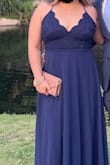 Lovely dress. Got lots of compliments. Had to get it hemmed because I'm short. - Veronica C.