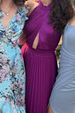 This dress is gorgeous -and the color is really unmatched by any other. Truly unique and definitely a head turner. I did use a little body tape just to be sure since I wore it to a wedding and knew I would be dancing a bunch. Didn't have to think about the dress unless someone was complimenting me. Such a fun dress and out of my norm but so glad I purchased it! - Kelsey C.