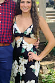 Overall 3.5/5 I'd say. It's a nice idea for a design but this dress isn't the best for every body type imo. It might work better if I had a larger chest and ribs that didn't stick out, but even if that were the case there is no support in the chest area. The material has no stretch also but fit true to size. The black pattern is nice because this material shows every crease under the dress too. I got a small and I usually wear a true size 5/6 in clothing. Length was fine. No weird slit that revealed too much throughout the night either, which I enjoyed. - Danielle K.
