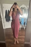 I wore this dress to my sisters bridal shower and it was perfect! It was so comfortable and flattering, I got so many compliments! I will say, the top is much larger than advertised and was very low cut. I had to get alterations and even after wound up pinning the back so it covered everything it needed to. I would definitely recommend the dress, but might consider sizing down (if between two sizes) and be ready to get it altered or pinned! - Danielle B.