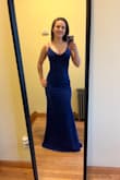 I ultimately did not choose to wear this for the occasion I ordered it for because it was unflattering on my body type. HOWEVER, it's a GORGEOUS, very well made dress and the material is thick and high quality. I would recommend this dress for taller folks. - Gretchen F.