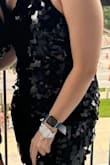 I wore this dress to TS Era's Tour N13 and got lots of compliments on it. However it was really uncomfortable to sit, the sequins do fall off easily like some of the reviews have stated, and some of the sequins received to lay flat against my body which was annoying. It also awkwardly sat loose around the upper chest and mock neck where I definitely regretted not pinning it before the concert. I also have yet to wash it as I am scared more sequins will come off afterward. - Raegan C.