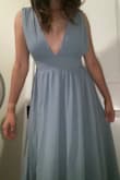 I got this for a wedding and the color was easy to pair! A comfy and cute flowy dress. But the alterations cost more than the dress& its pretty long and the top is loose around the chest and shoulder area so be prepared if you need the dress quick for your event! - Jessica H.