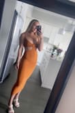 Wore this dress for my birthday in Nashville! Obsessed with the color and style. - Caitlyn D.