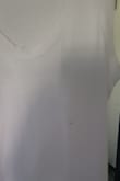 Loved the scoop neck until I looked down and noticed the hole. Nice thick fabric. Not thin like most summer tanks. So the hole is probably not an issue with others that purchased. The fit was perfect for me. Not too loose & also not tight around my mid section. Would've been wearing this a lot - Chris M.
