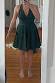 This dress was, overall, a good purchase and I've worn it twice to different wedding-related events.  Beautiful color and shape.  The one issue is that with a larger bust, there is potential for a lot of gapping at the neckline when you move around and it's not really possible to wear a bra with it.  If you can pin the neckline together successfully, you're probably all set, but that didn't really work for me.  I ended up tying a ribbon around the straps at my neck in the back to hold the front more in place. - Sarah S.