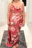 It's cute, soft and comfortable material. The color is a little less vibrant and the flower pattern seemed to be bigger and a little different laid in the front. The flowers right on front were way to big and different than the picture. I am 5'3 and would need to get a lot of the bottom taken off to shorten it. Plus you can't wear a bra with it, which might be an issue with a bigger bust. For the price and alterations needed to be done, I decided to return. - Christa C.
