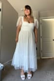 I really like this dress. Still unsure on the sleeves as I find they do look a bit poofier in person but for the rest of the dress I love it. Also the boob cups aren't really cups. The front is kind of flat just a warning! - Jordyn B.