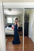 This does run large in my opinion. I usually wear a 2, or 4 or 6 in regular clothing, a 0 for prom dresses and size S. I bought an XS and since the straps were adjustable, it worked out!! It's VERY long, I'm really tall and it went perfectly to the ground when I wore 3.5" heels but it has extra fabric at the bottom without heels. And the color isn't exactly as advertised in the photos depending on the light, it's a more royal/navy blue and more vibrant. But not discounting the dress at all!! Love it so much and for so many compliments. 10/10 - Fiona B.