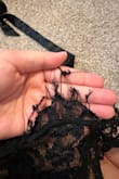 Just received this piece and was so excited to try it on! The fit was a tad too big, could have gone down a size. I'm a true medium 6/8. I put this in cold wash, gentle cycle, on its own and took it out of the washer to hang dry. I was so bummed to see how torn up the edges got. This is my first lingerie purchase and really sad it turned out this way. Unfortunately, I can return it since I washed it already. For anyone purchasing, don't run this in the washer, even if you're only washing this piece. - Emily X.