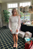 Bought this dress for my bridal shower , very flattering, especially how it ties across the front to make your waist look more cinched. - Alex Z.