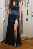 This is gorgeous. Excellent material so flattering. But definitely not for summer. Feels kind of thick for summer. Also the slit is very high so maybe consider that as well. Might become kind of uncomfortable while dancing. - Matina Z.