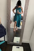 This color is gorgeous! It is so flattering on my skin. I had to really shorten the strap to make the pleats at the top stay flat but with somebody tape it should be fine. It clearly needs steaming but that's just because the material is satin. Love it! - Priya G.