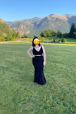 Dress fit like a glove! The fabric had a bit of stretch to it so it didn't feel too tight, and showed off my curves! It was floor length so I could wear comfortable shoes without drawing attention to them. I was very comfortable in this dress. - Laura K.