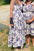 The material is thick, well made. The skirt has a lot of fabric and its huge! Perfect twirling dress. The straps are 100% adjustable since you have to tie the bows yourself. Im in love with this dress - Katie G.