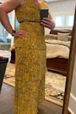 Fits perfectly, can't wait to wear it to a garden party this summer.  I typically wear a 14/XL and I got the XL.  Good quality, great value. - Rachel H.