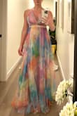 As someone who is just under 5'9", finding the perfect length can sometimes be a challenge, but this dress fits like a dream! The flowing design gracefully brushes the floor, giving me an elegant and elongated silhouette. The vibrant colors instantly uplift my mood, making it a true summer standout. If you're looking for a maxi dress that's both flattering and vibrant, this one is a must-have. - Amber T.