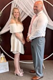 Bought this for my courthouse wedding and it was perfect! Absolutely beautiful dress, fit perfect and stayed up really well! - Nicole H.