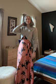 This is my new favorite sweater! It's different, very soft, and fits me perfectly. I am on the smaller side bust-wise, so I don't know if that's why the fit works so well for me. I find I can also wear it over a fitted top without it looking strange. I sized down and glad I did. Works great with high with waisted pants. I get compliments every time I wear it! - Marijke U.