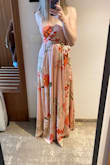 This dress is beautiful and great value for the money. I had to shorten it a bit but I expected that. There are small details that give away the fact that it is not a super expensive dress but other than that it looks amazing. Would definitely but it again. - Hana M.
