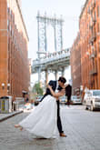 I loved the dress the moment I saw it here. It was a bit large for my upper body, so I altered it at a local dressmaker place. With 3.5 in heels, the dress has the perfect length for me. I wore this dress for our wedding photoshoot in NYC. Highly recommend. - Iuliia M.