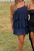 I wore this dress to a summer beach wedding and it was perfect! It's lightweight and flowy, which was perfect for hot weather and great for dancing. I got so many compliments on it. Because the reviews said it runs large, I ordered a small instead of my usual medium and it worked great! The elastic around the top isn't that tight, so I used a couple of pieces of double sided fashion tape to hold it where it wanted. I also recommend wearing shorts underneath, because it is a short dress! - Allison D.