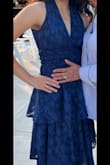 Such a cute dress. Great quality. Giving 4 stars only because it does not come with a built in bra and your not able to wear a bra with this b/c its front and back open so I just stuck some padding to it. - Emely G.