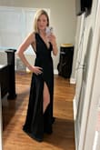 I thought this dress was beautiful! The material was sturdy and the dress well made. I did use tape to keep the top in place because it was a little loose for me. It runs very long and even with a 4 in heel, it dragged the ground a bit. I was overall very pleased with the fit, style, and appearance. - Lezly C.