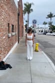 Loved this set, wore it for my bachelorette. I got so many compliments on it and the pants were super comfortable. I am a 34D so the top was a little tight but not bad and I wore sneakers, didn't need to hem the pants. Want to get this in all the colors - Elyse L.